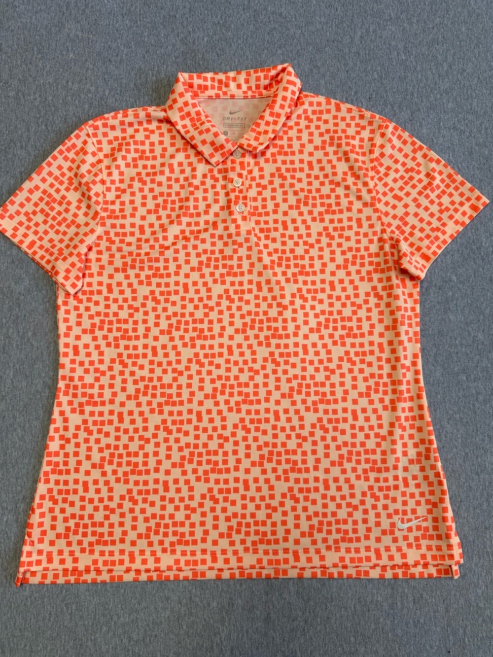 Nike Women’s Cream Polo with Bright Orange Geo-Print